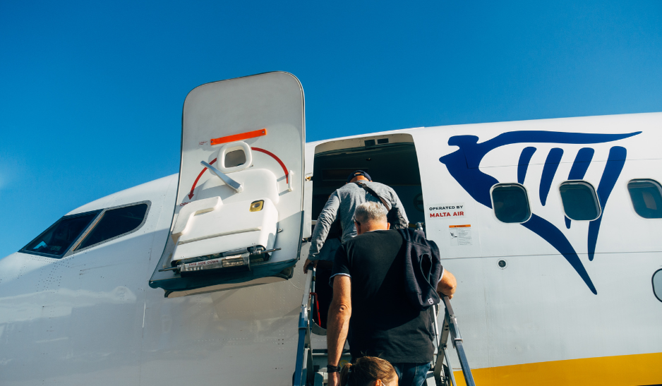 Passengers boarding an airplane