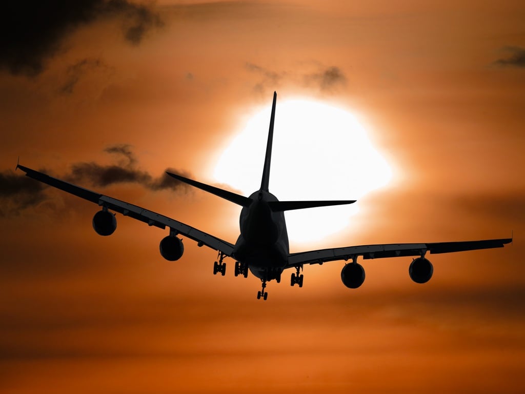 Airplane sunset image